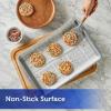 imageReynolds Kitchens Cookie Baking Sheets PreCut Baking Parchment Paper Sheets for Cookies OvenSafe up to 425 Degrees Reusable Up to 3X NoMess Cleanup 12 in x 16 in 22 Count